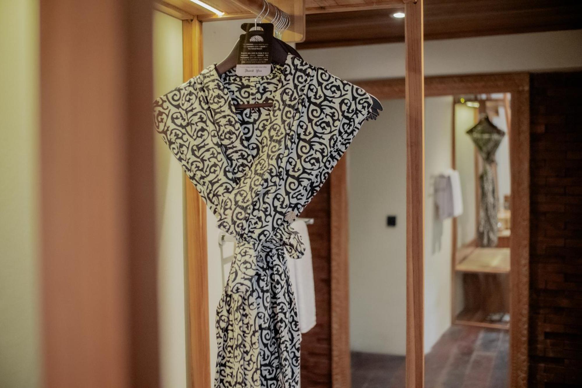 The Sebali Resort Ubud  Bagian luar foto A bathrobe hanging on a hanger